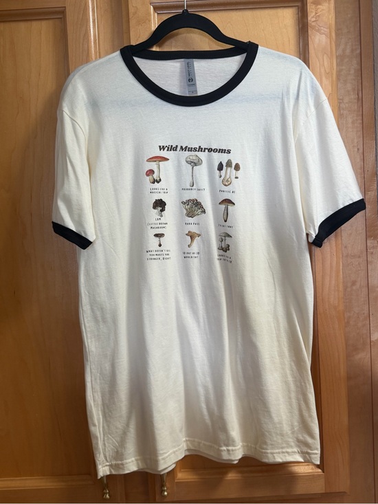 Next Level Apparel Tops - Next Level Apparel Cream Ringer Tee with Black Trim and Mushroom Graphic